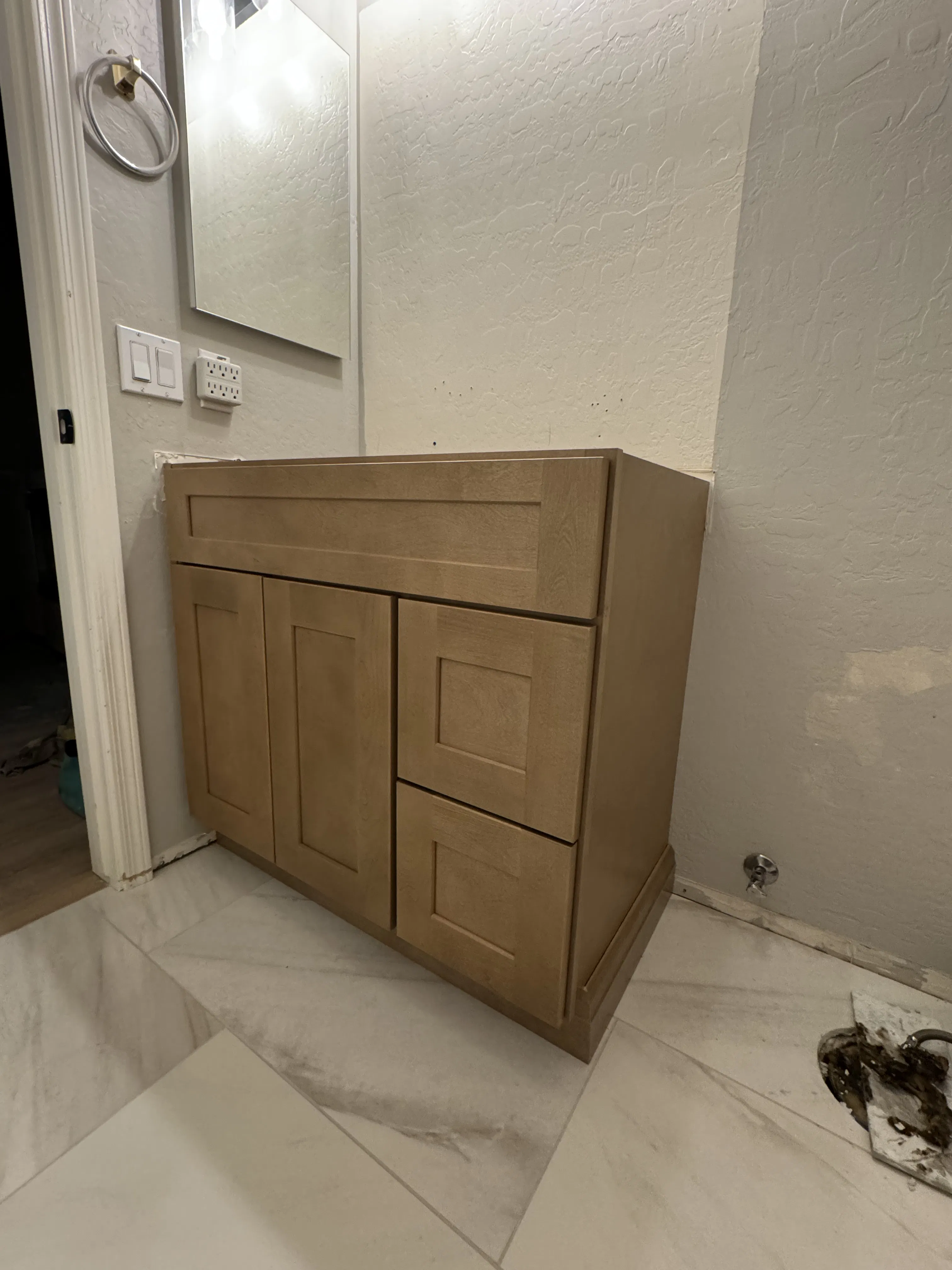 Project Bathroom Vanity Cabinet Installation Mid-Remodel image