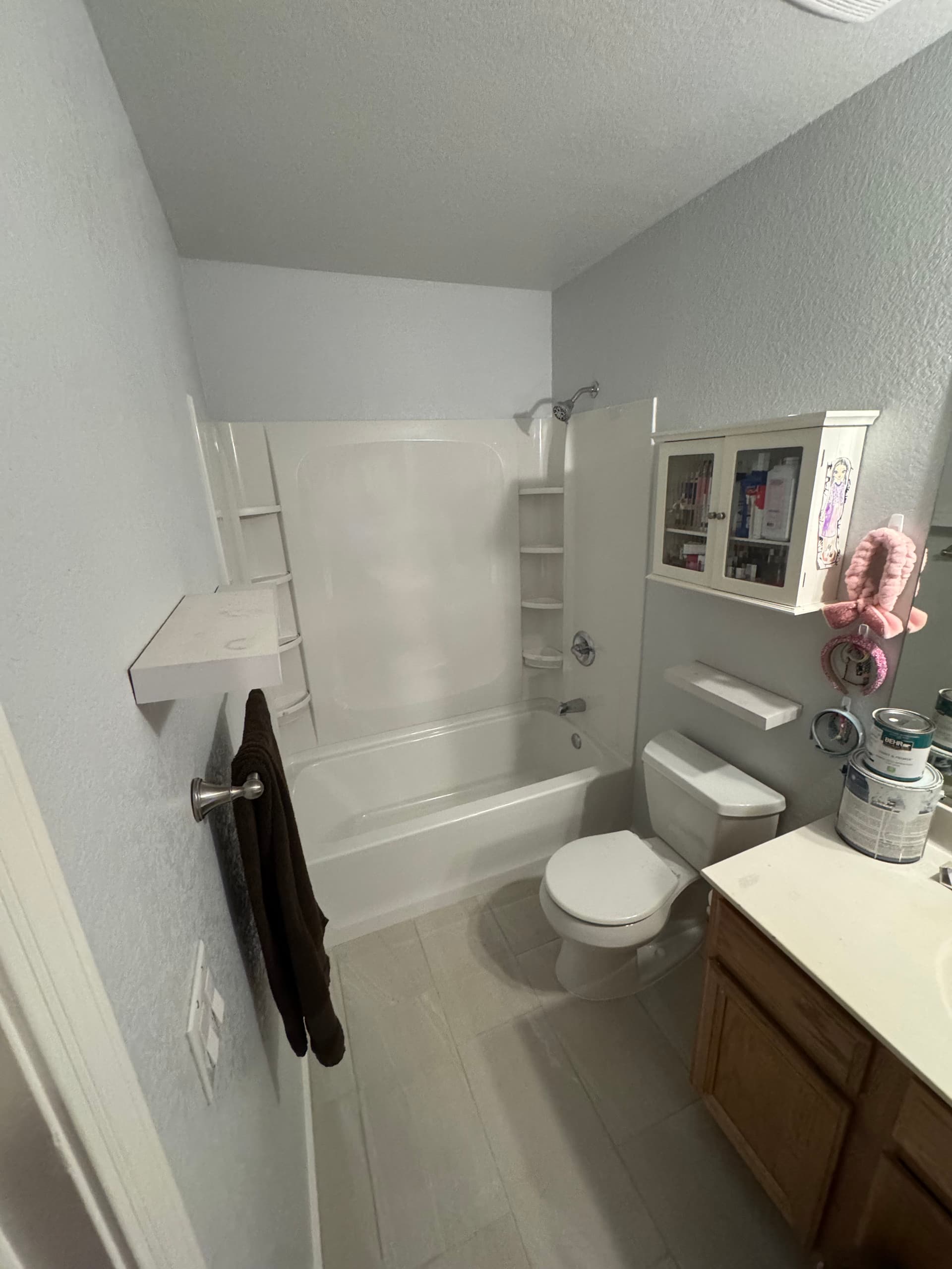Bathroom Renovation with New Shower, Trim, and Flooring image