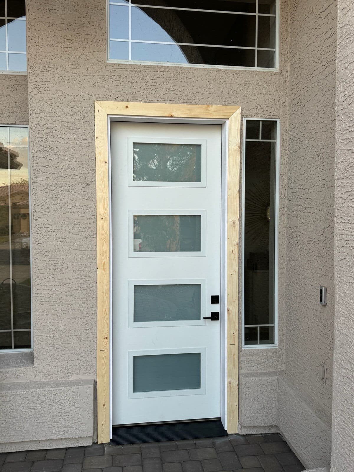 Modern Glass Door Upgrade Elevates Entryway
