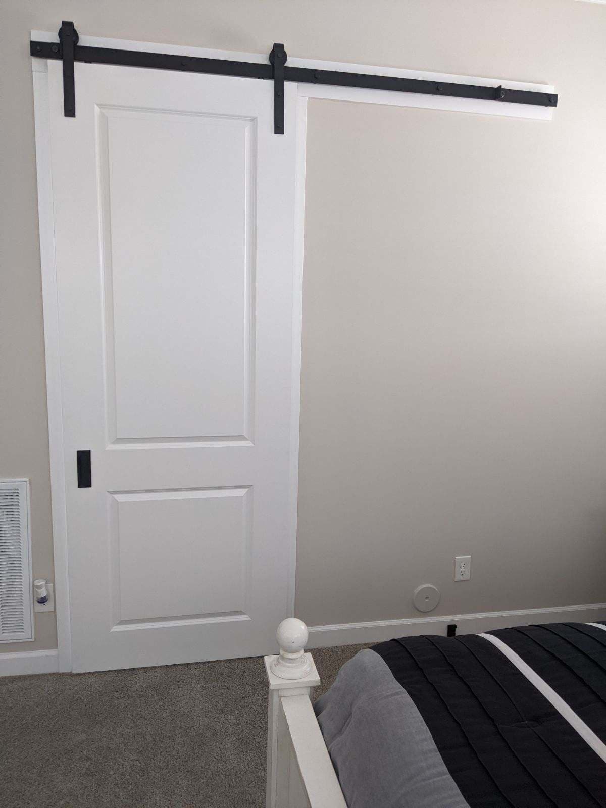 Gallery photos for Stylish Space-Saving Barn Door Installation: Image #1