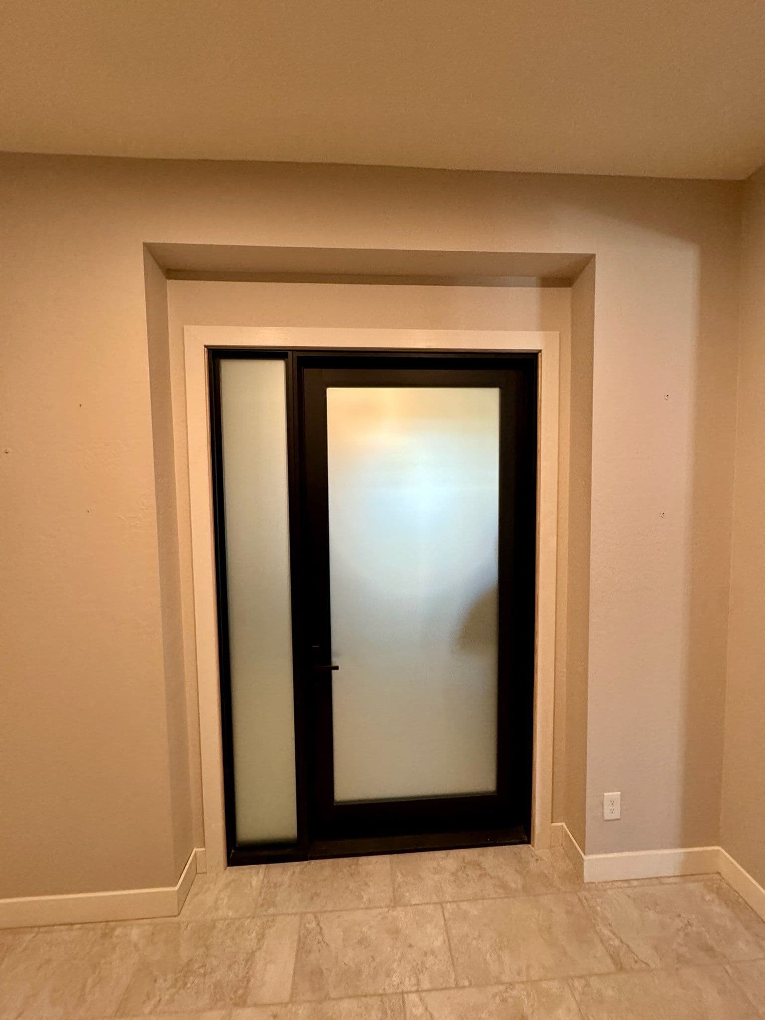 Gallery photos for Stylish Black-Framed Glass Door Installation: Image #1